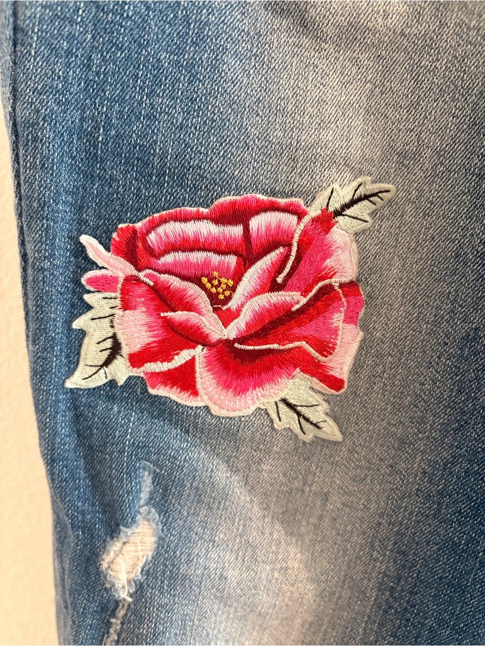 Women’s Black Daisy Blue Distressed Jeans with Red Rose Embroidered Patches - Picture 4 of 6